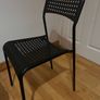 Black plastic chairs Image 3