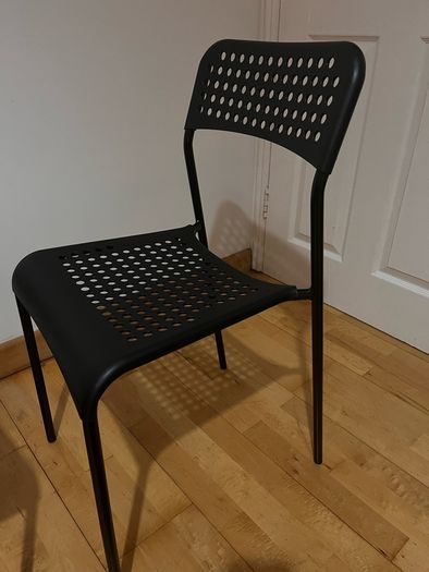 Black plastic chairs