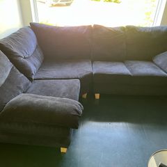 Black velvet corner sofa