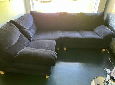 Black velvet corner sofa