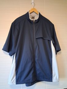 Golf Jacket. Official Greg Norman Half Sleeve Windcheater Mens Golf Jacket. Collect In Dublin Or Receive Via Post.