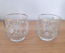2 vintage etched glasses with gilt rims