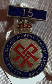 two militaria in this ad, boxed King's badge