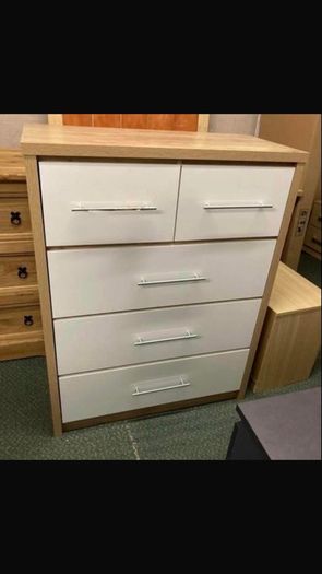 This is a Seconique Seville 5 Drawer Chest in White Gloss/Light Oak Effect Veneer.