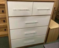 This is a Seconique Seville 5 Drawer Chest in White Gloss/Light Oak Effect Veneer.