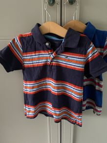 2 striped aTommy Hilfiger polo shirts