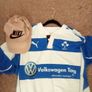 Large. Rugby. Jersey. And.  Nike. Cap Image 3