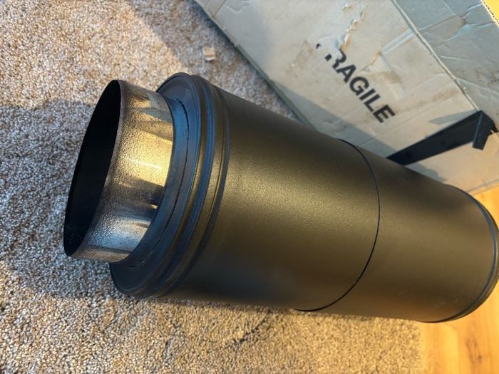 Adjustable twin wall flue