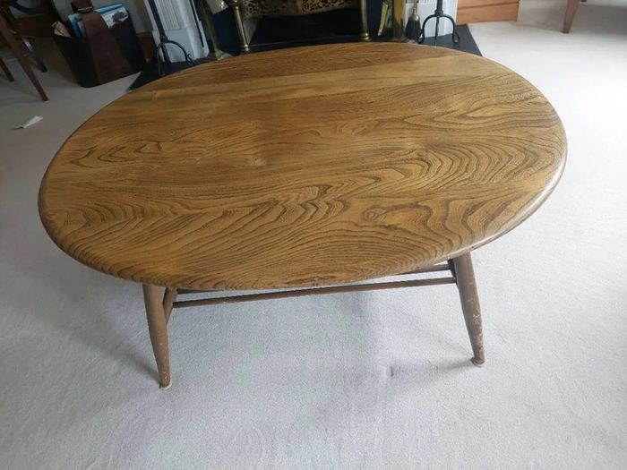 Vintage Ercol style oval coffee table with magazine rack