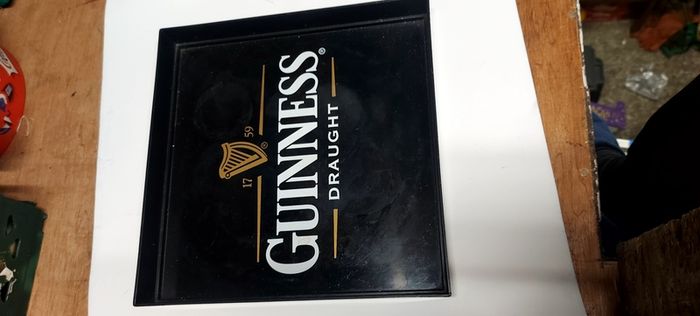 Guinness square drinks tray ,unusual item square ,buyer collects or pays postage, see pictures for condition ,used condition few marks, good solid condition,,sold as is .