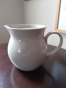 Pottery Pitcher with Ice Section