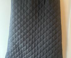 Carolyn Donnelly the Edit Quilted black midi skirt with slits uk8
