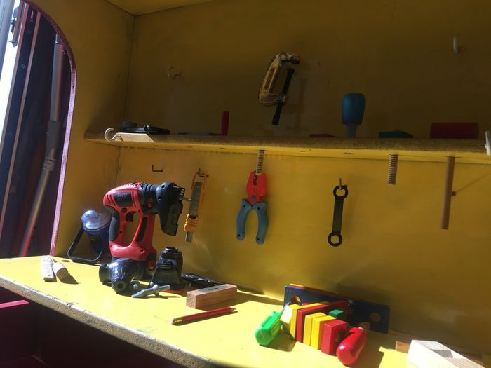 Kids work shop play station dresser with tools.