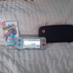 Nintendo Switch Lite (Zacian & Zamazenta Edition) + Pokemon Sword + Case