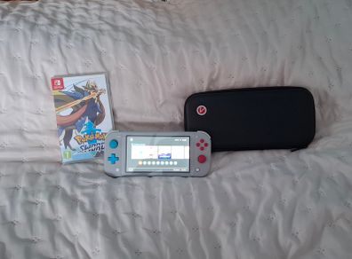 Nintendo Switch Lite (Zacian & Zamazenta Edition) + Pokemon Sword + Case
