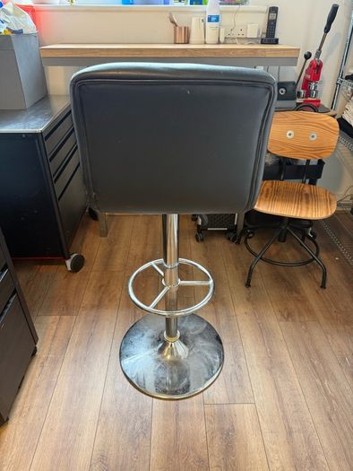 black faux leather bar stool