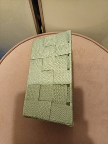 Green storage basket with metal frame