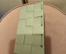 Green storage basket with metal frame