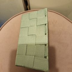 Green storage basket with metal frame
