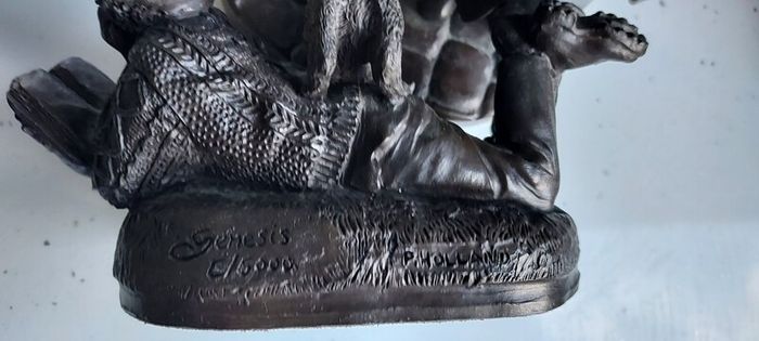 Genesis bronze boy reading with dog