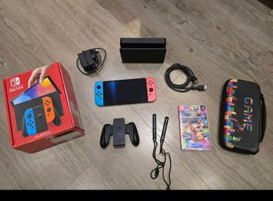 Nintendo Switch OLED Console + Mario Kart 8 Deluxe + Carry Case + Box