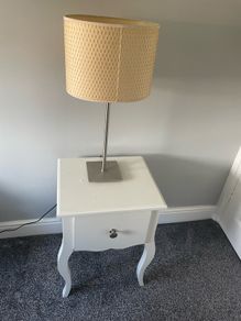 bedside locker and lamp