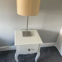 bedside locker and lamp