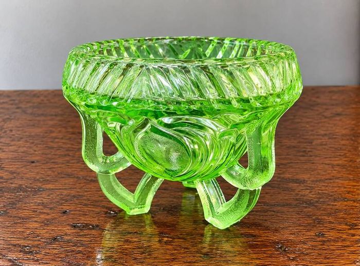 Vintage Sowerby Green glass bowl on three feet