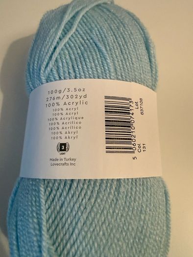 6 balls of blue yarn wool