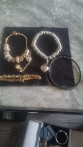 4 bracelets gold and silver