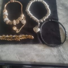 4 bracelets gold and silver