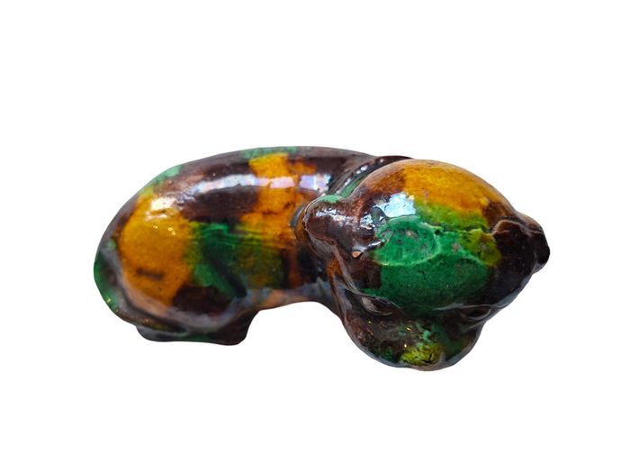 Chinese Antique 'egg and spinach'-glazed biscuit porcelain figure of a Dog Kangxi