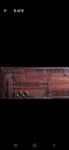 Carved wooden banknote. 100 yuan.