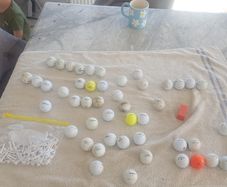 golf ball and tees