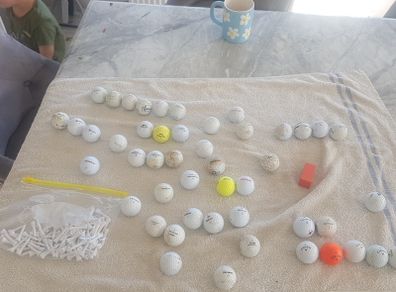 golf ball and tees