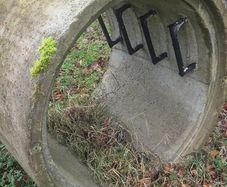 manhole ring with concrete lid