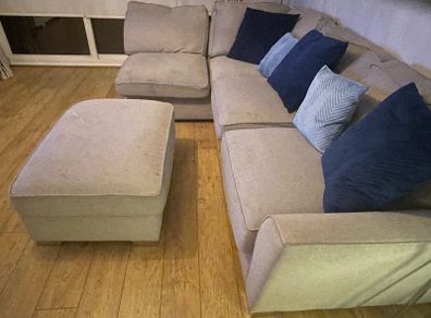 Large grey L shaped sofa & matching footstool
