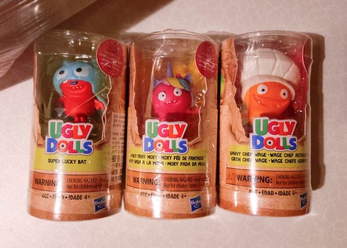 3 Ugly Dolls In Plastic Case (new).