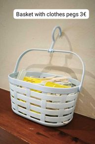 Clothes peg basket with pegs