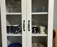 White cabinet with glass doors
