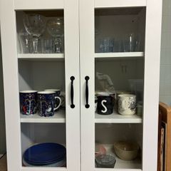 White cabinet with glass doors