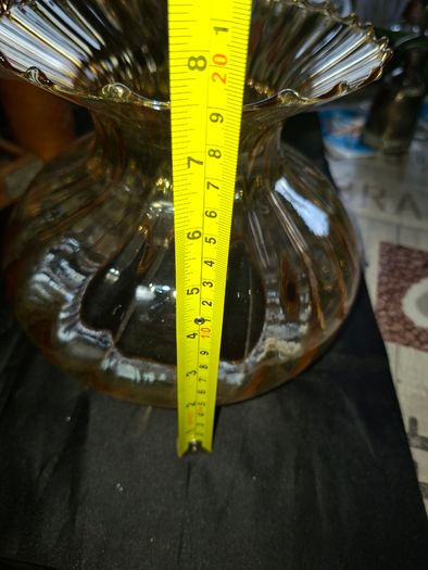 A Beautiful Amber Glass Oil Lamp Shade featuring a bulbous, ribbed body and a wide, ruffled, fluted rim, Postage Available