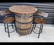 Whiskey barrel and stools