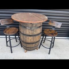 Whiskey barrel and stools