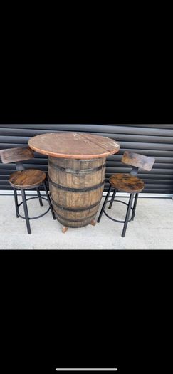 Whiskey barrel and stools