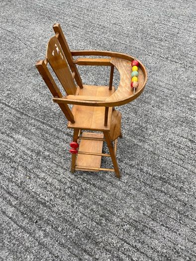 Vintage wooden doll high chair FROM THE 1930S featuring a built-in play tray with a wire bead