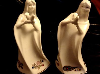 Two Royal Tara Ladies Holding a Bird