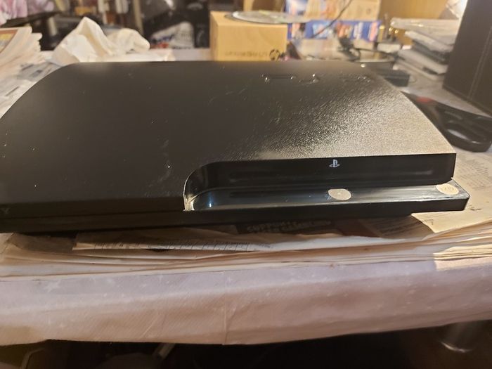 SONY Playstation 3, Model CECH-2503A, comes with Power Cable, 1 Controller, Call of Duty Game, Powers on and off, and takes in and ejects disks