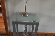table with table lamp and vase