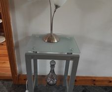 table with table lamp and vase